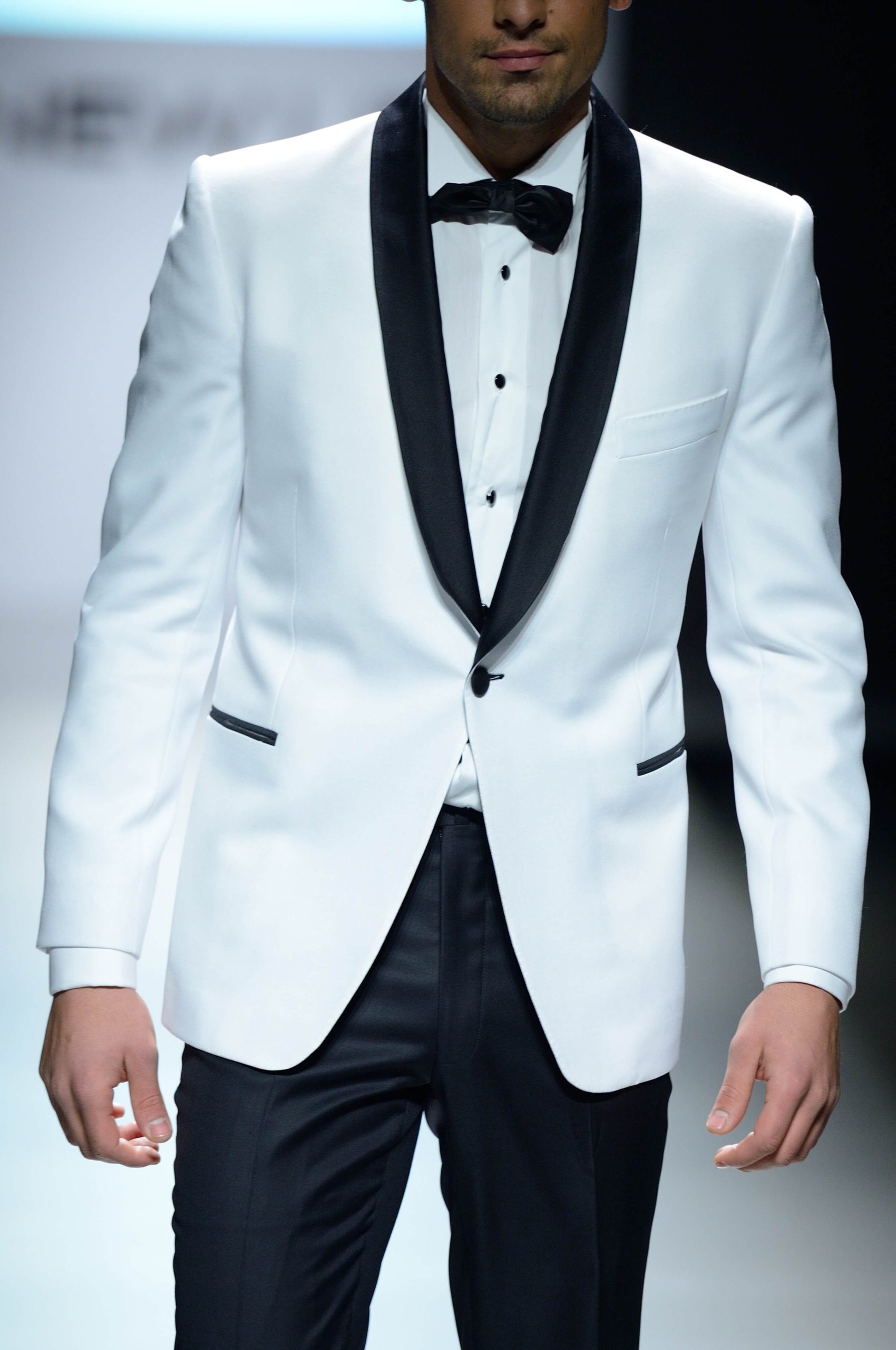 WHITE TUXEDO WITH BLACK LAPELS